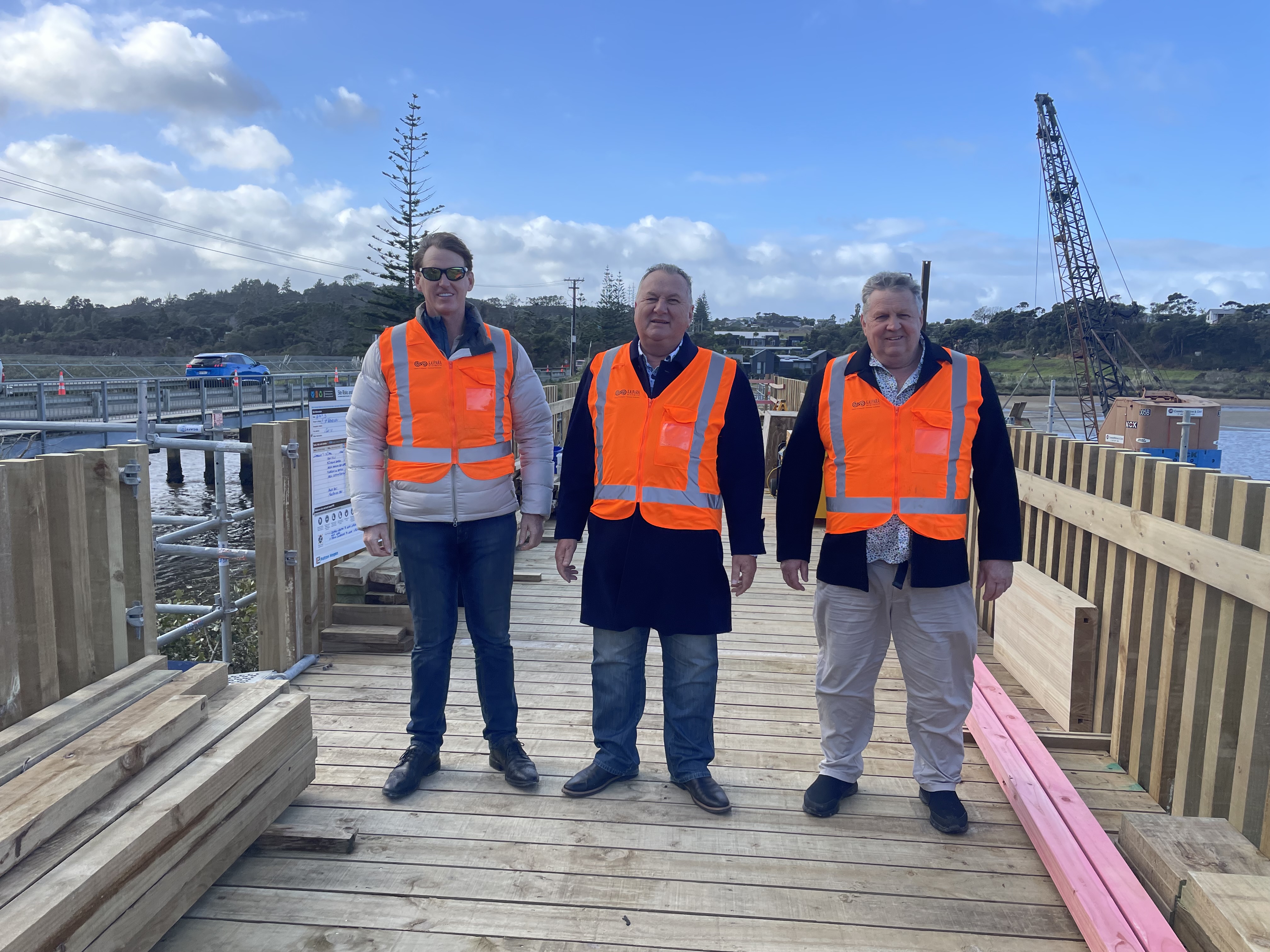 Photo of Kaipara District Council Mayor Craig Jepson, Kaipara District Council Deputy Mayor Jonathan Larsen and former minister for Regional Economic Development Shane Jones on the boardwalk section of the shared path